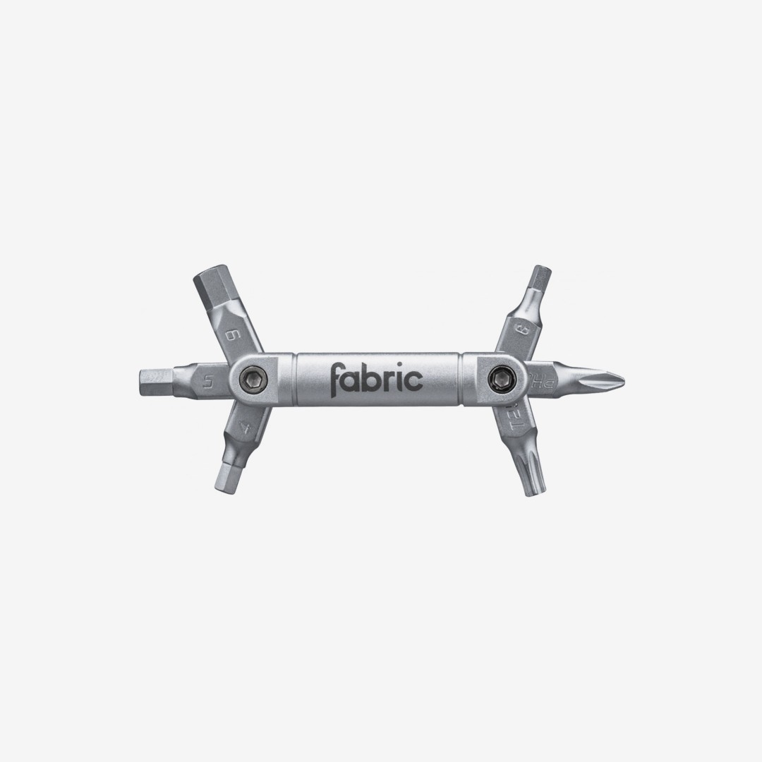 Fabric 6 in 1 Gereedschap uitgeklapt met alle zes bits: inbus 3, 4, 5, 6 mm, kruiskop PH2 en Torx T25
