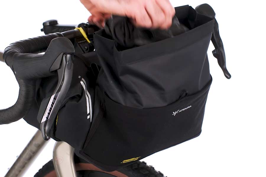 Roll-top closure with cord hook on the Apidura Expedition Front Accessory Pack