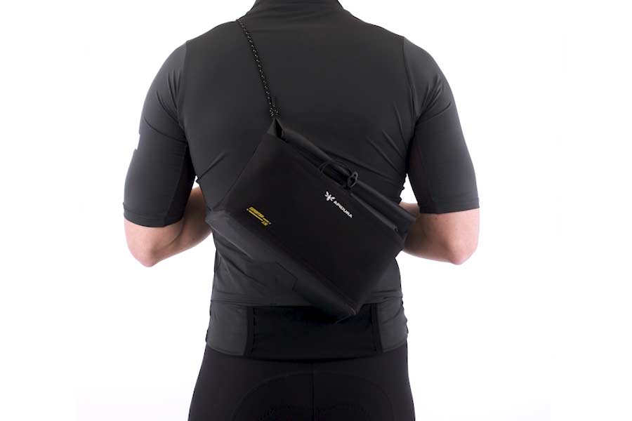 Apidura Expedition Front Accessory Pack worn as a crossbody bag
