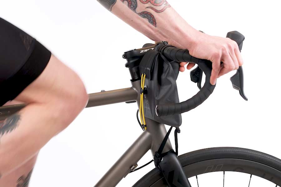 Tapered shape of the Apidura Expedition Stem Pack for knee clearance