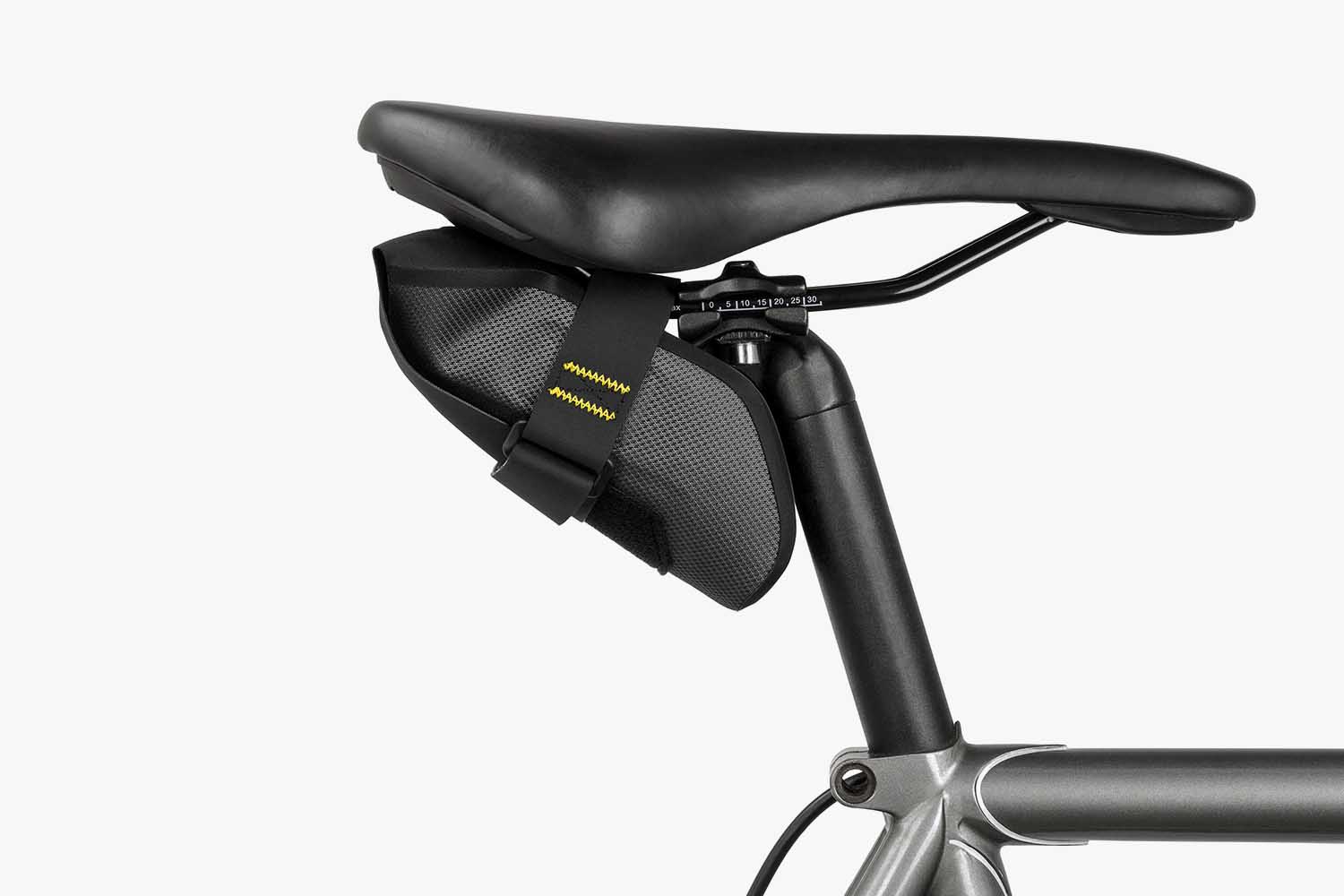 Apidura Expedition Tool Pack under the saddle of a bike