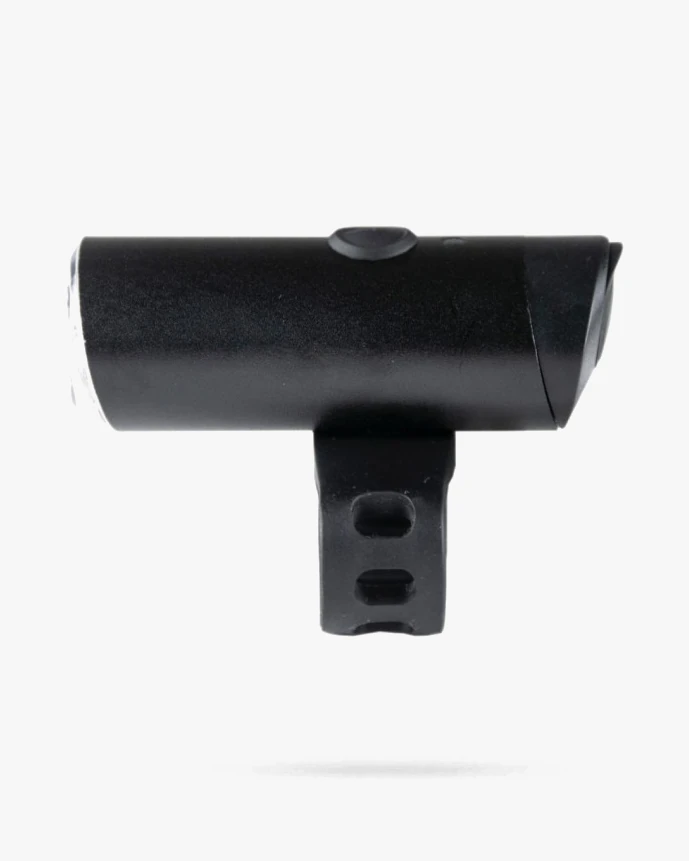 Black Glow front light seen head-on with its white lens and the silicone strap looped beneath the body