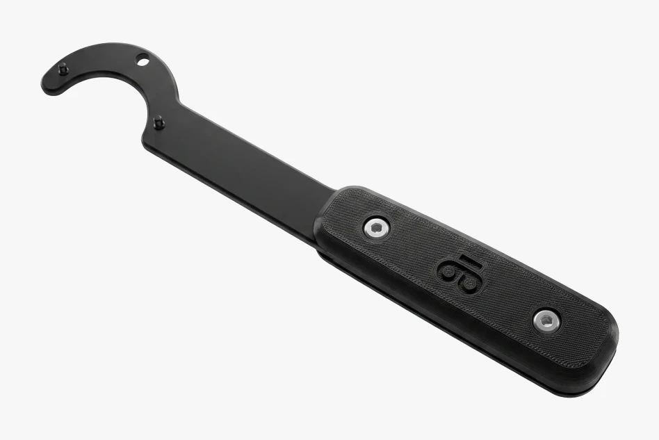 Black eccentric bottom bracket tool with a hooked end and a thicker handle with a logo