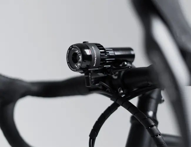 Supernova Airstream 2 battery-powered headlight mounted on the handlebar