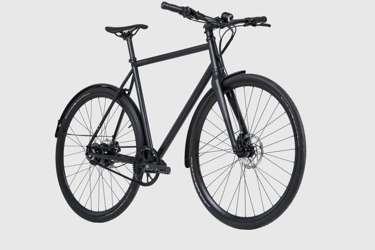 Booda Bike Pulse in three-quarter view with front and rear mudguards over the wheels