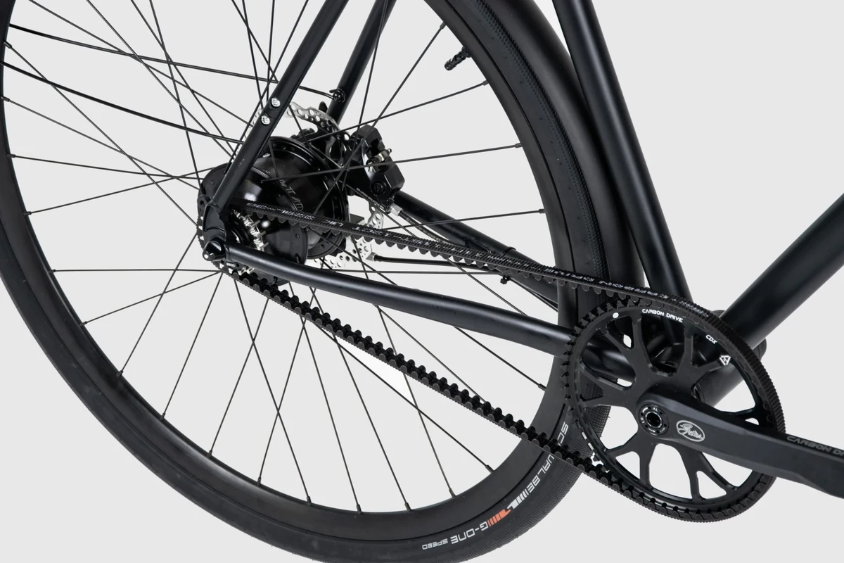 Rear triangle of a Booda Bike Pulse with the Gates belt running from the bottom bracket sprocket to the rear hub