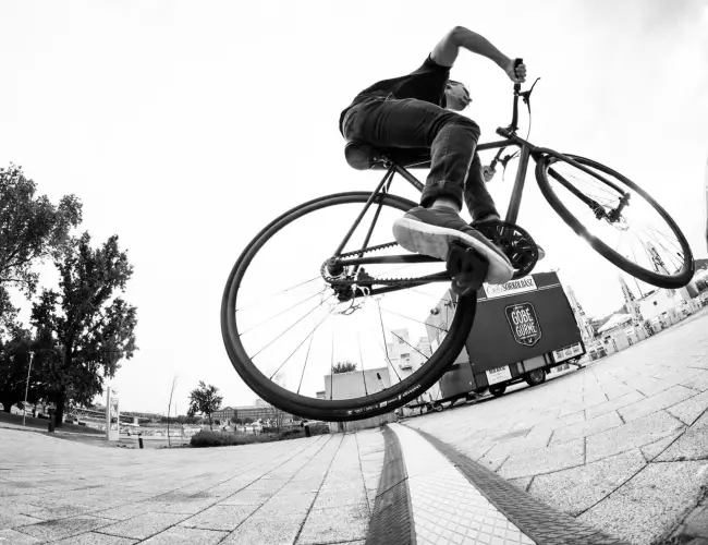 Rider jumping a Booda Bike in the city