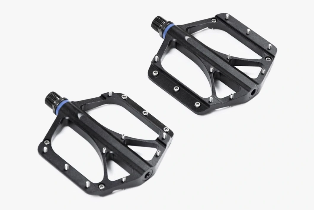 Pair of black aluminium Booda Bike Sport Pedal Alu flat pedals with studs around the platform and a blue ring at each axle
