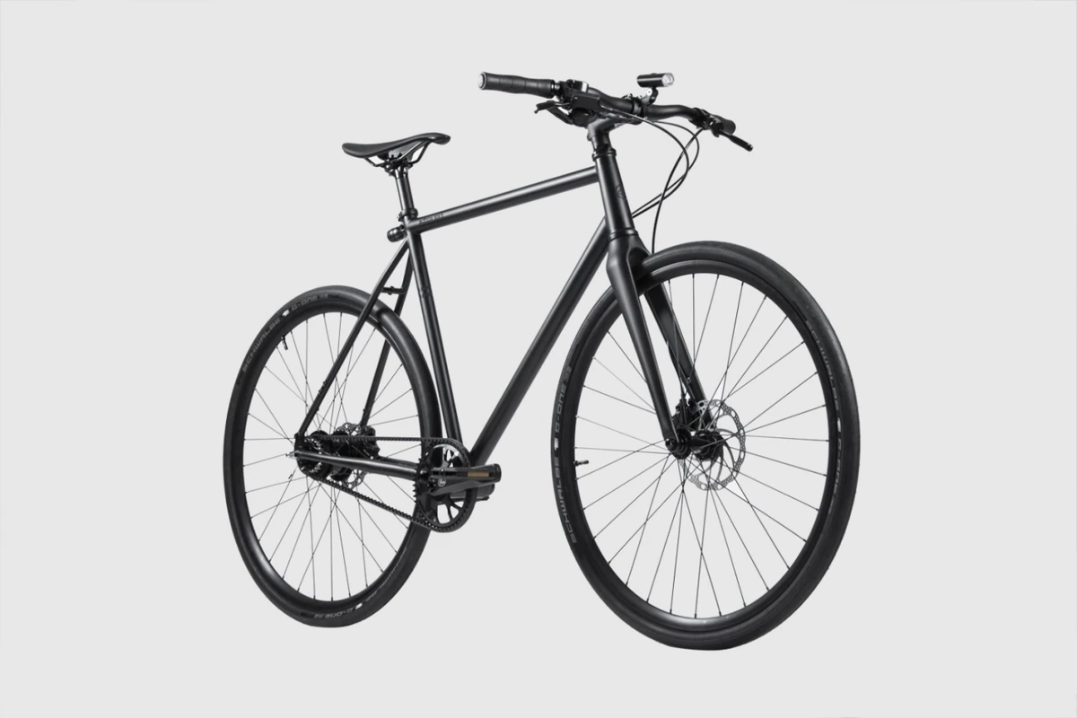 Black Booda Bike Banker belt-driven bike, front three-quarter view on a light grey background