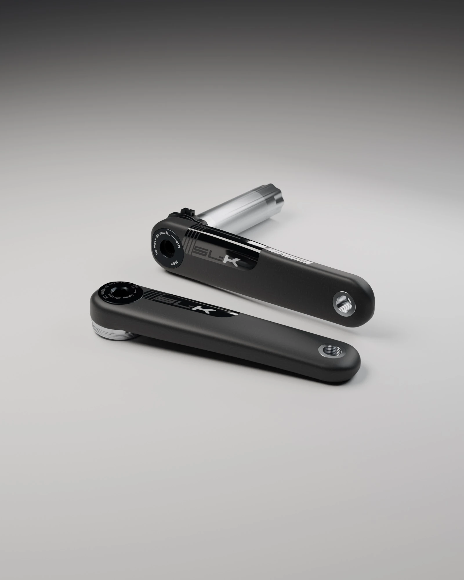 FSA SL-K carbon crank arms, left and right, with the spindle on the drive-side arm, matte UD carbon with black and silver SL-K graphics