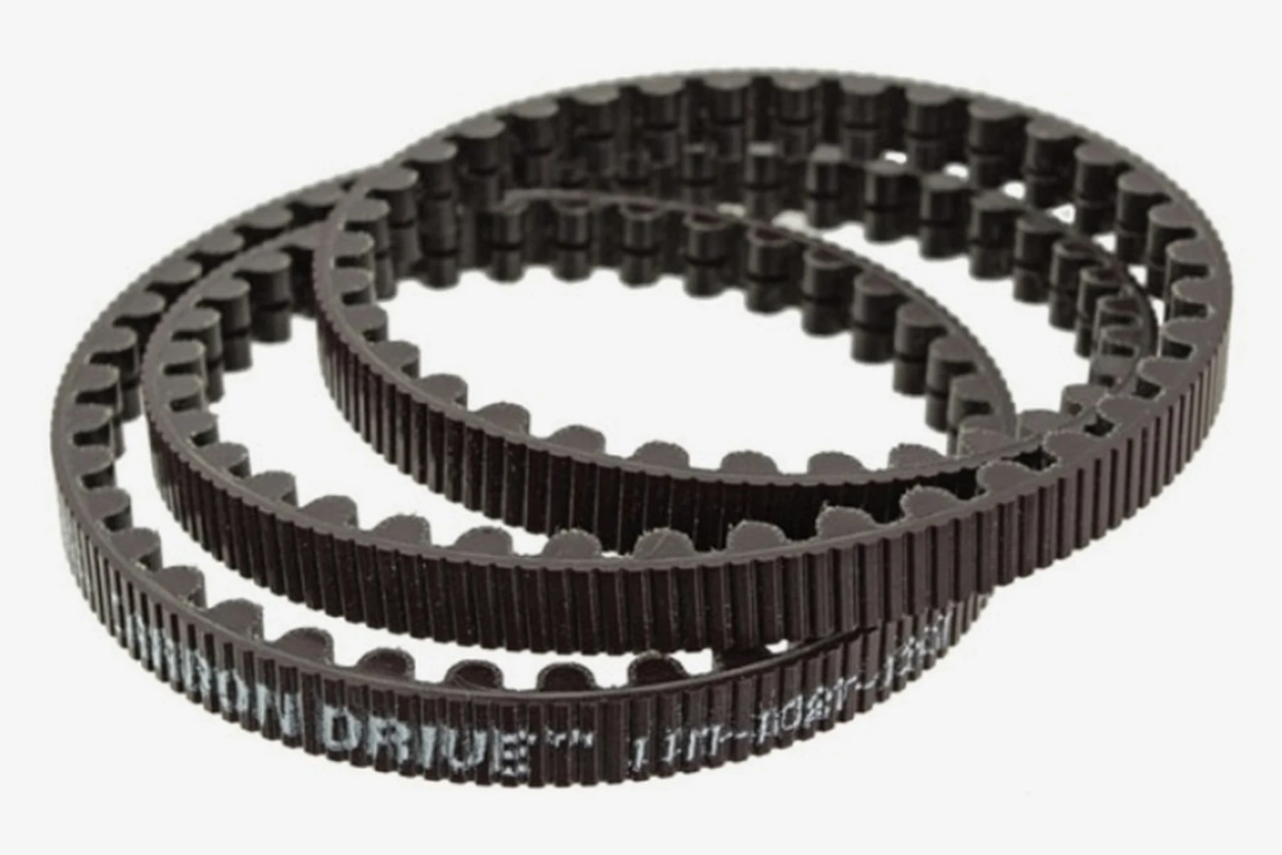 Two coiled black Gates Carbon Drive CDX belts with the Carbon Drive print, on a light grey background