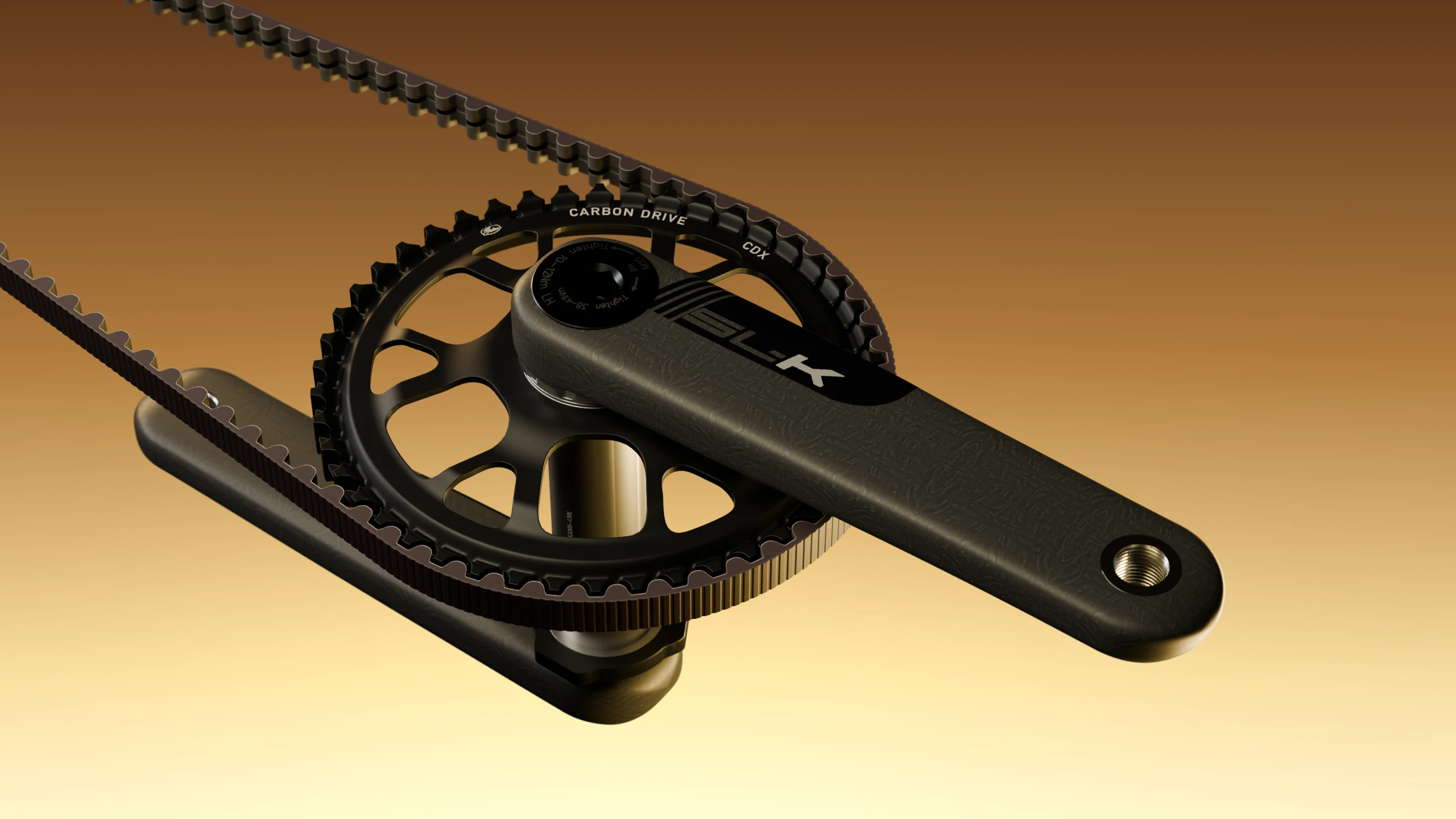 Close-up of the FSA SL-K carbon crank arm on a Gates Carbon Drive CDX front sprocket with the belt running over it