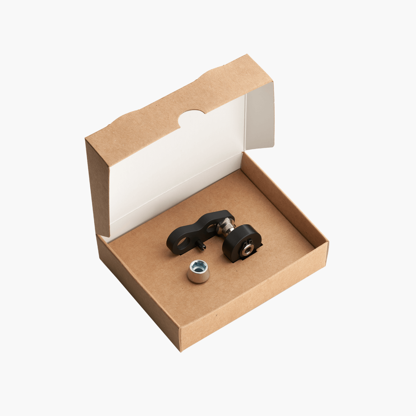 The Gates snubber in a cardboard box with its screw