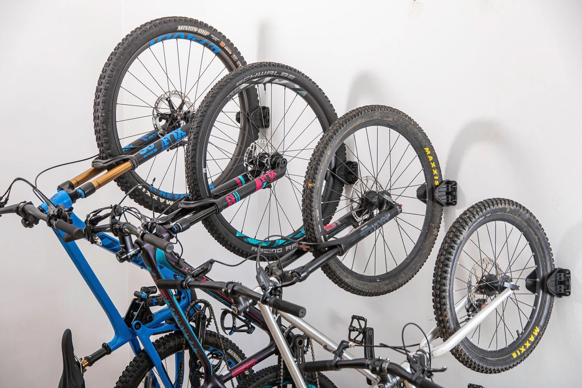 Family bikes stored on the wall with Hiplok JAW wall-mounted bike racks