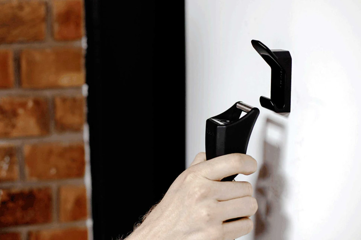 Hiplok Wall Hanger holding a chain lock on a wall