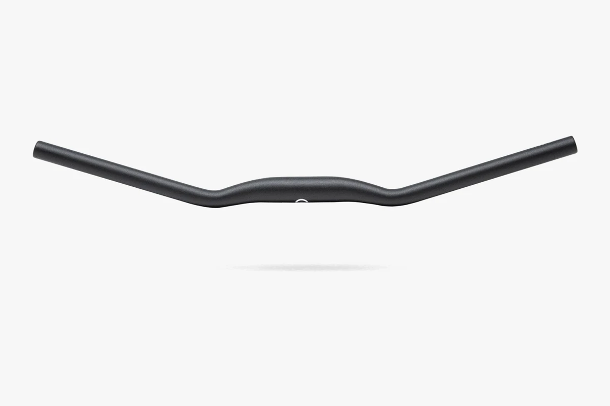Black Booda Bike aluminium Noirette handlebar seen at an angle from the front, with a gentle bend at each side of the centre