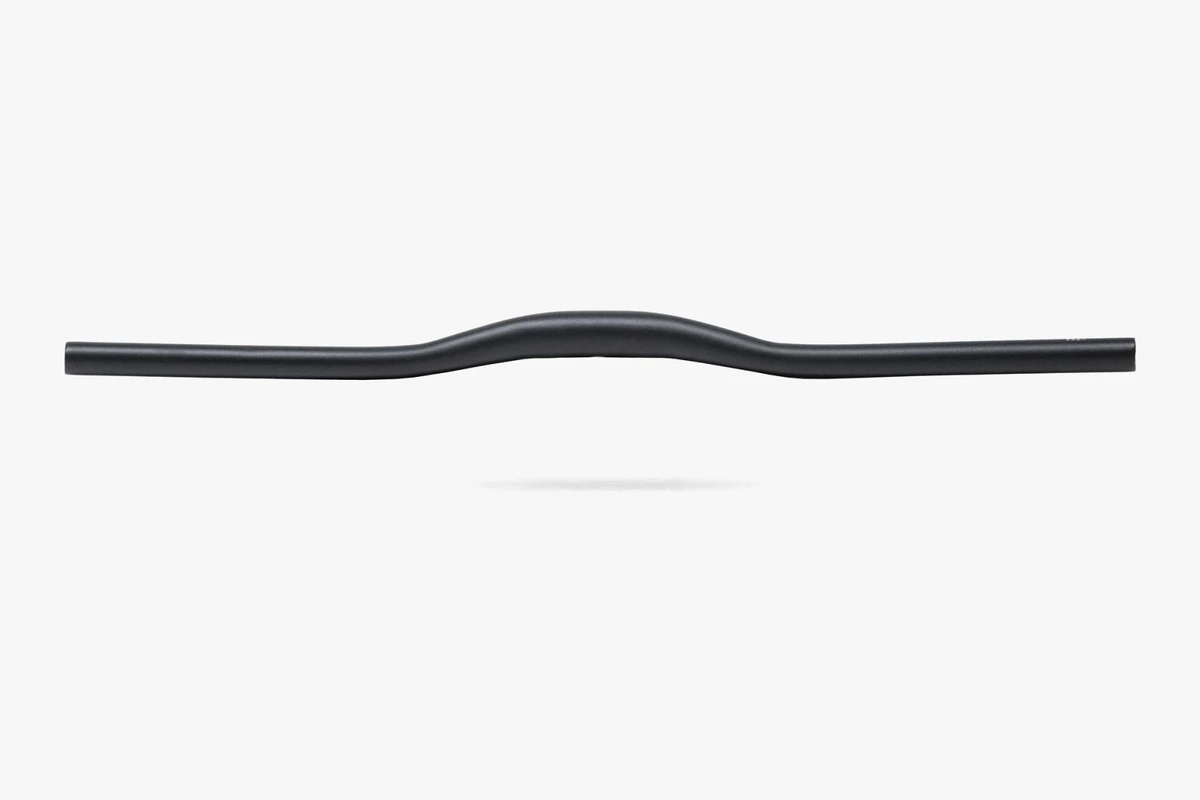 Black Booda Bike aluminium riser handlebar seen from the front, a wide bar with a gentle rise at the centre