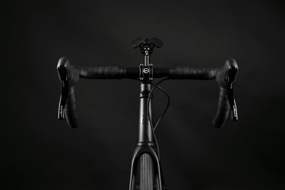Front view of the Booda Bike Astro cockpit: aluminium drop handlebar with brake levers and bar tape above the stem and head tube