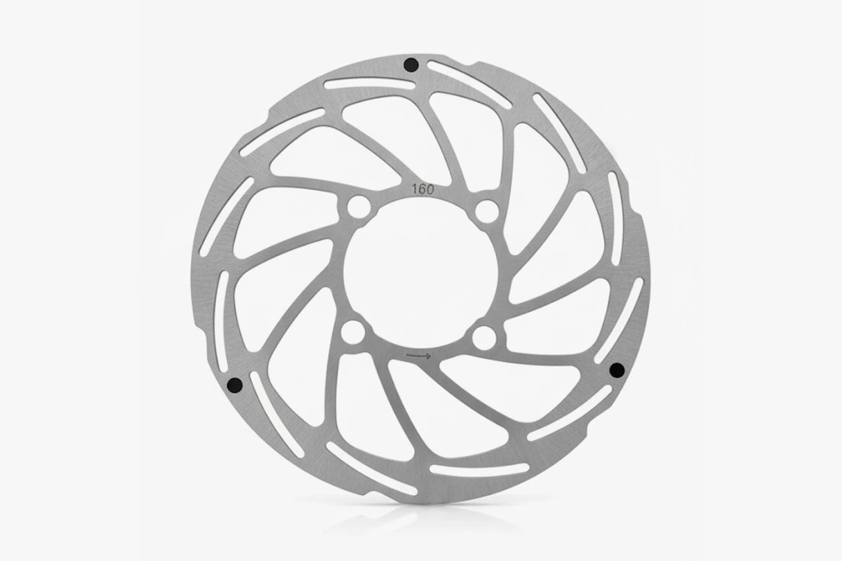 Possible 160 mm brake disc for Rohloff, a silver ring with four mounting holes around the centre and the number 160 printed on the disc