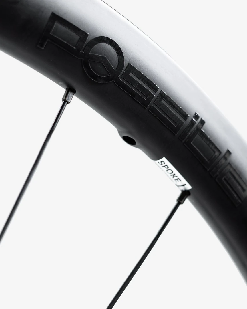 Possible carbon rim close-up with the Possible logo on the rim wall