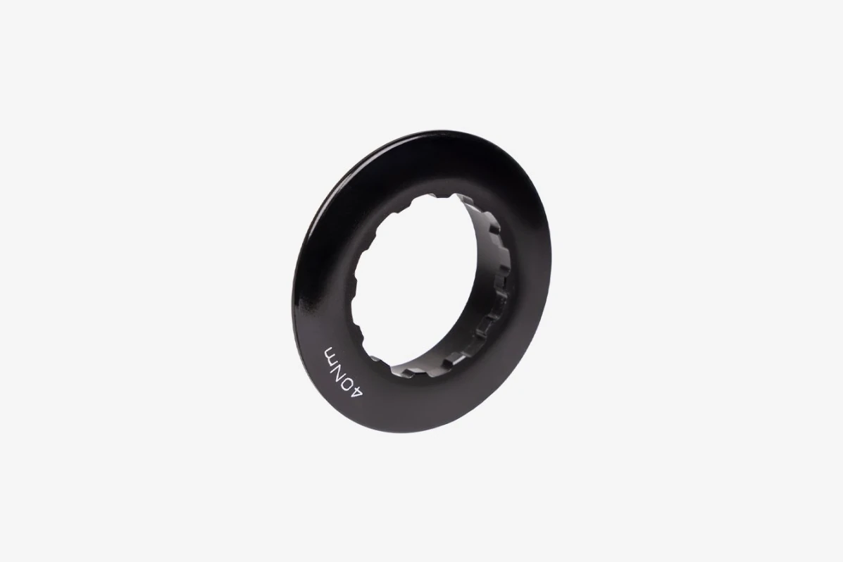 Possible SpinnerOne cassette lockring in black with engraved lettering