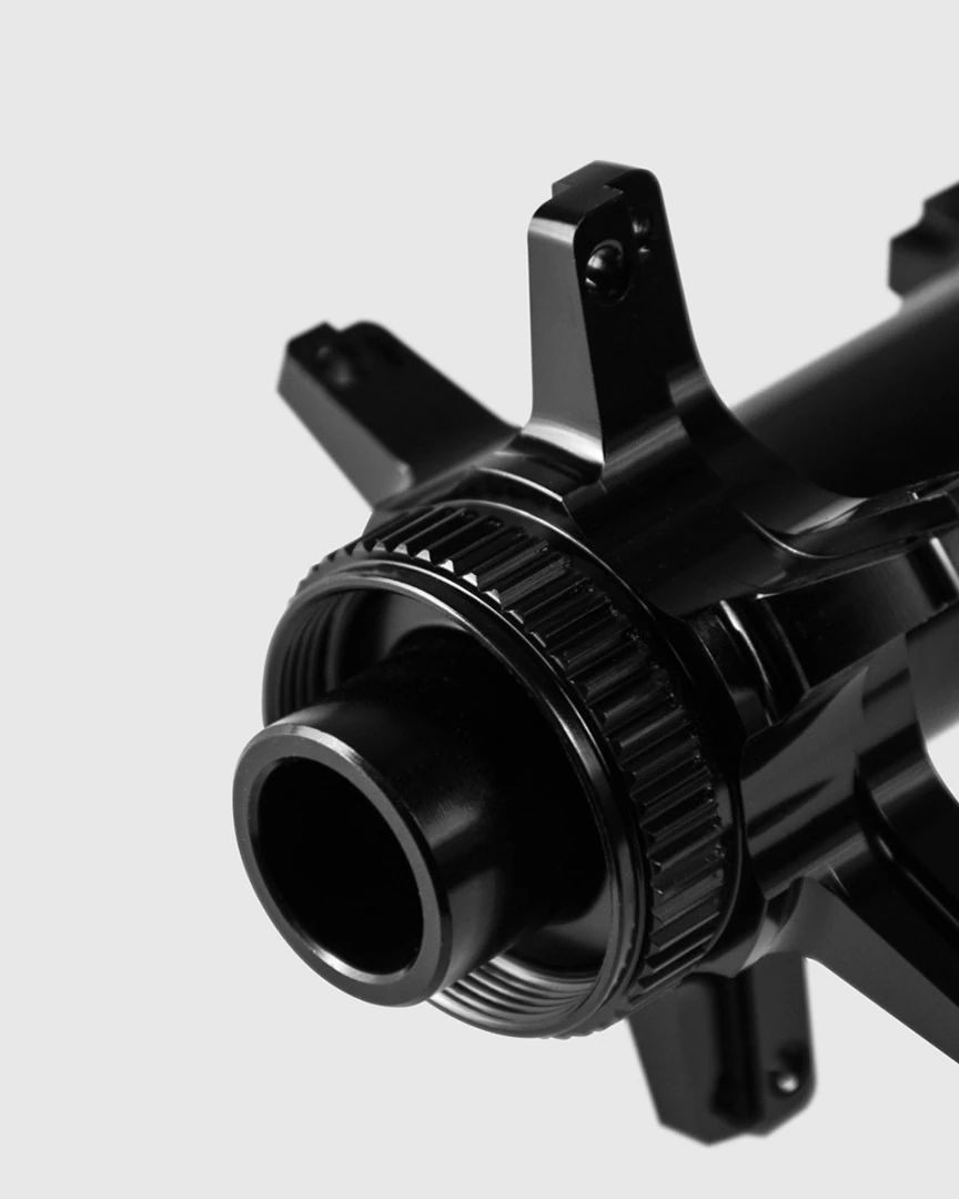 Possible SpinnerOne front hub close-up with Centerlock seat and 12 mm axle cap