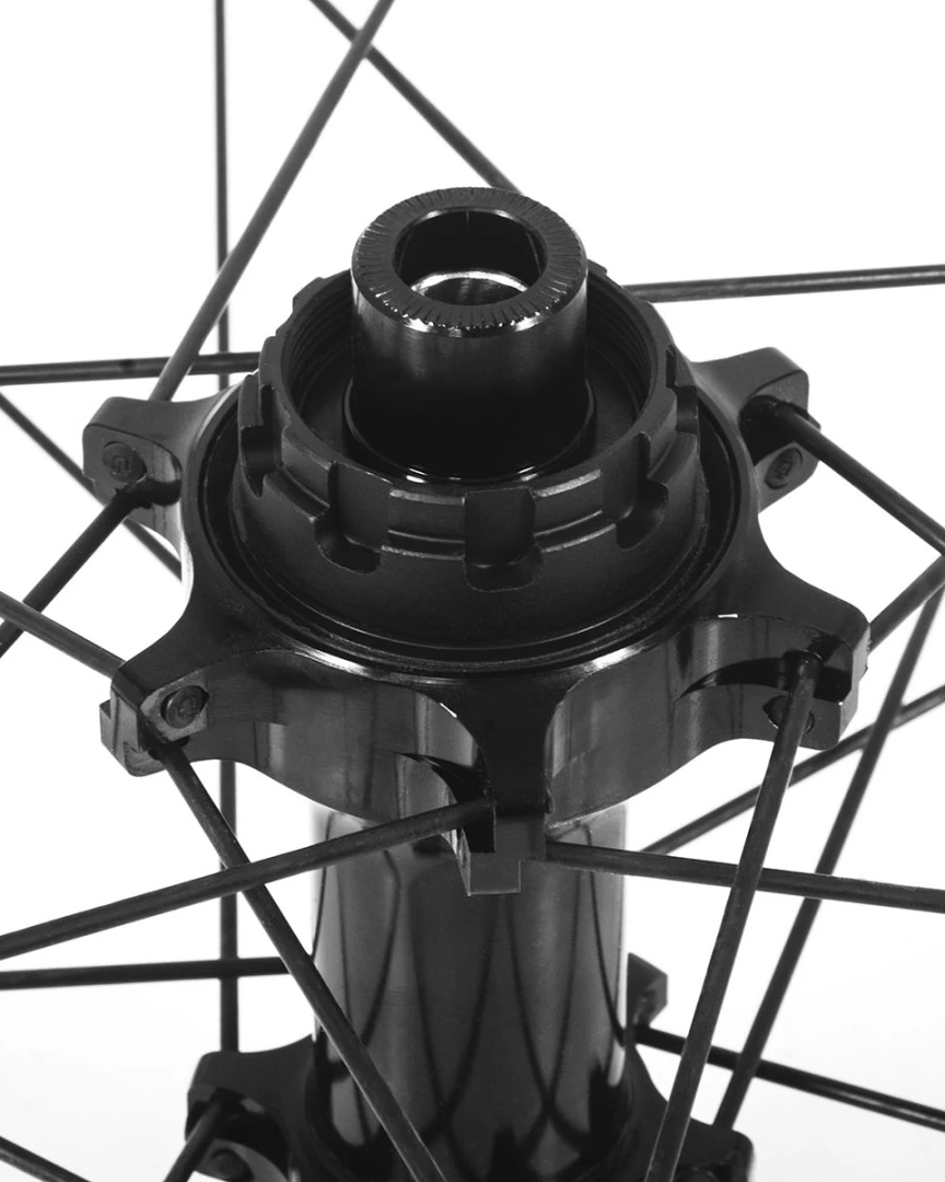 Possible SpinnerOne hub laced with black Sapim Sprint spokes, close-up