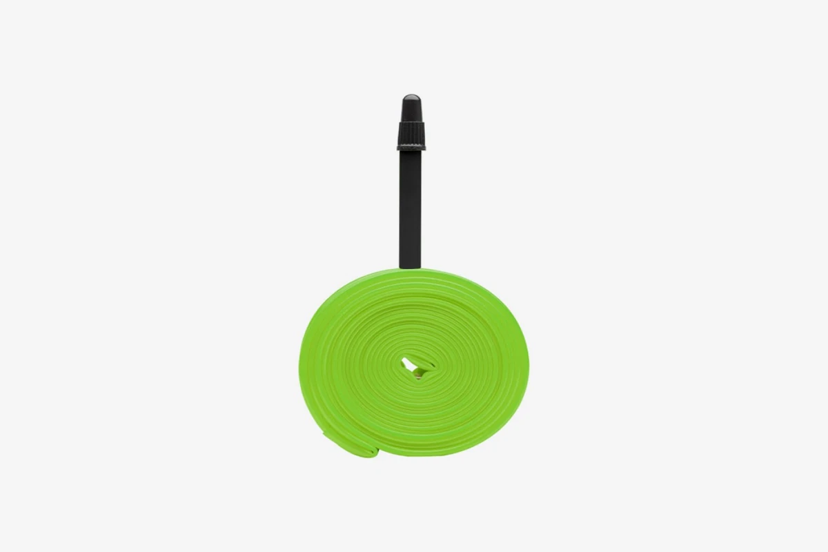 Possible green TPU inner tube with black 40 mm Presta valve, 28 mm width