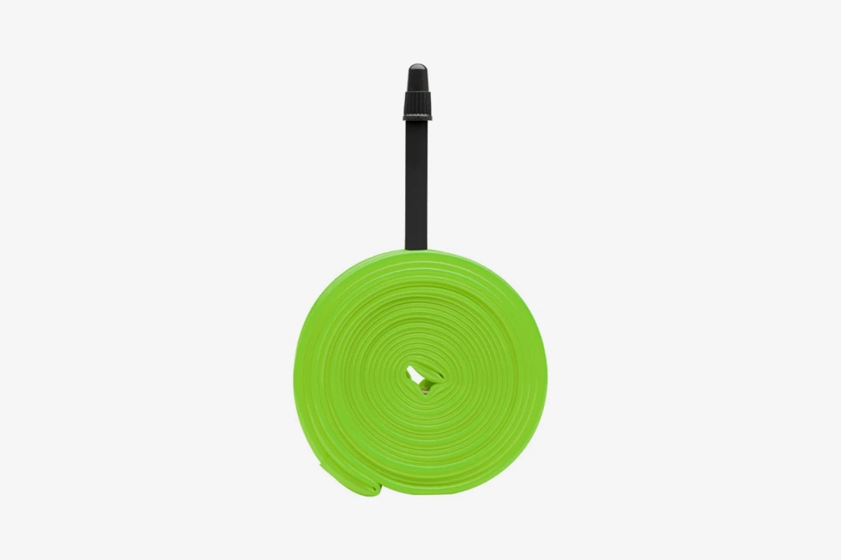 Possible green TPU inner tube with black 40 mm Presta valve, 32 mm width