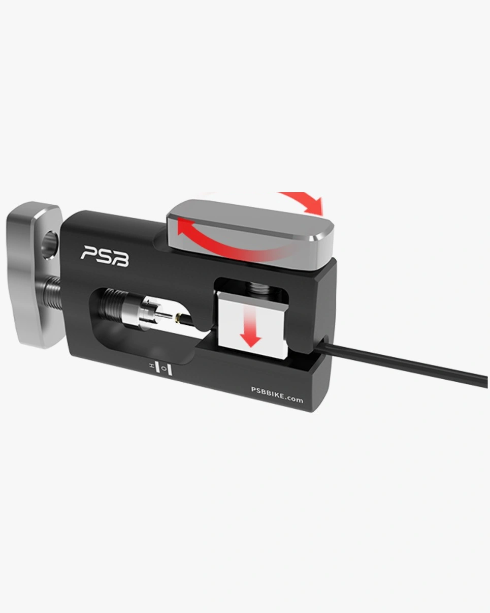 PSB Needle Driver Tool with red arrows showing the clamp being tightened onto a black brake hose