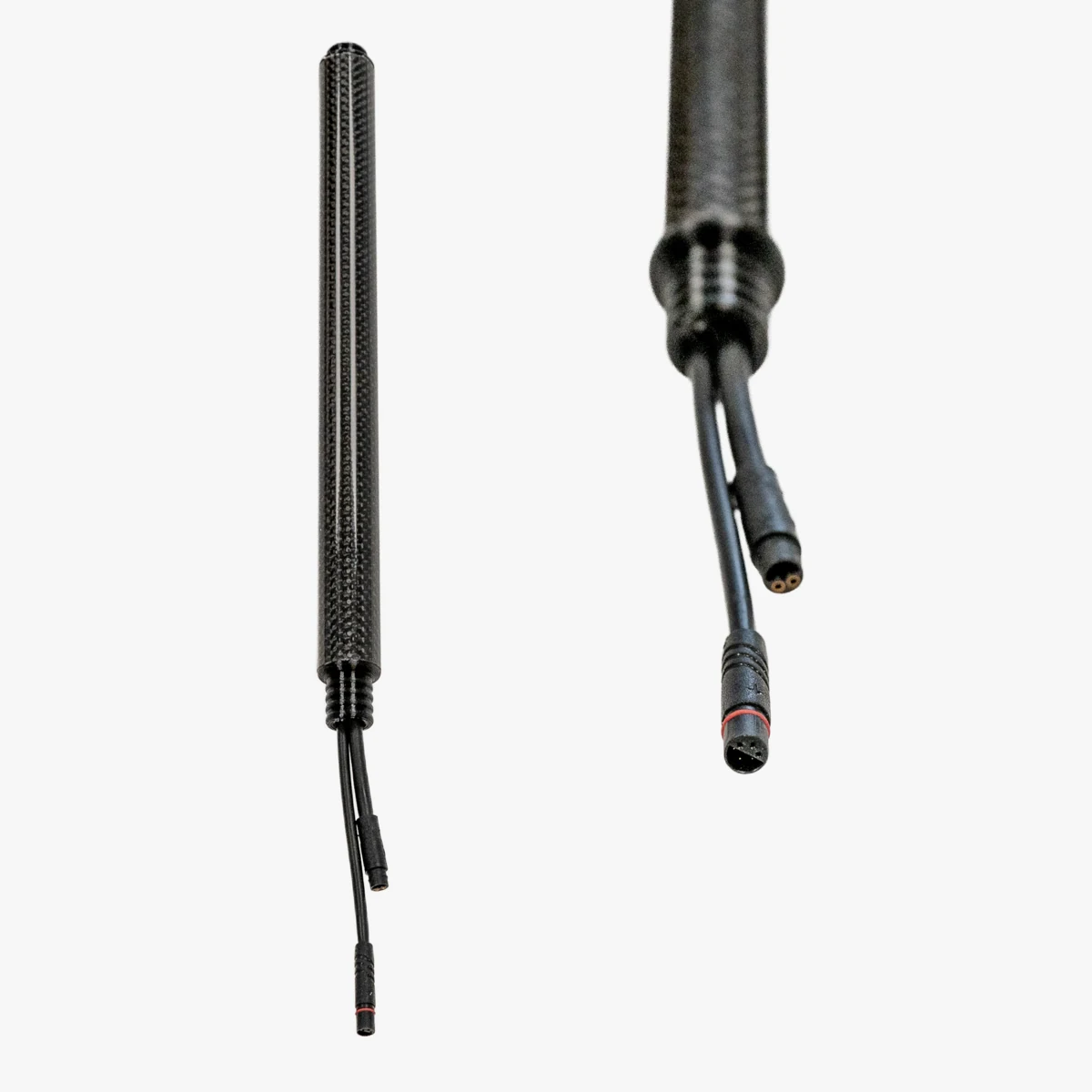 Rohloff E-14 Solo battery: a slim carbon tube with two cables and connectors, shown from the side and as a close-up of the cable end