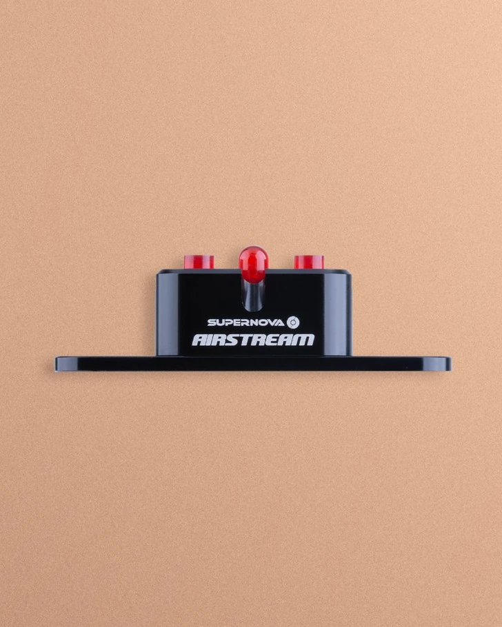 Airstream Tail Light 2 rack version seen from the side on a peach background, red LEDs on top