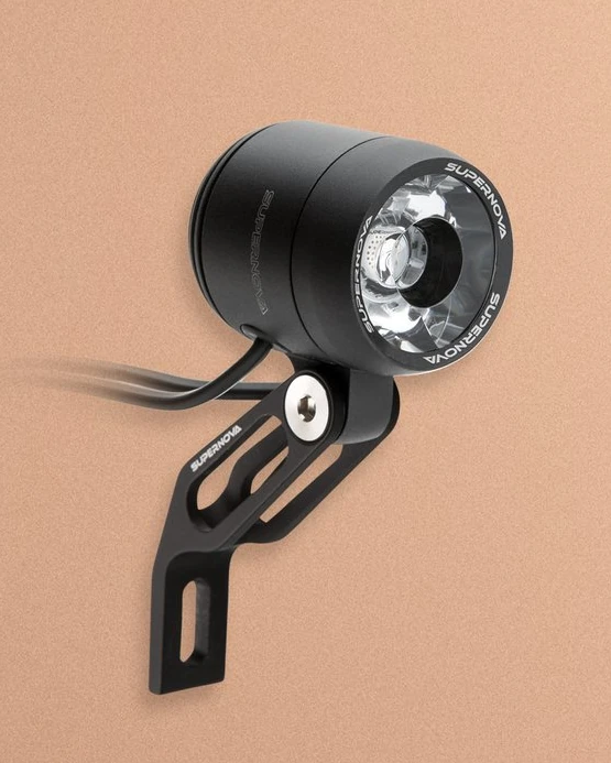 Supernova E3 Pure 3 with its fork bracket and cable on a peach background