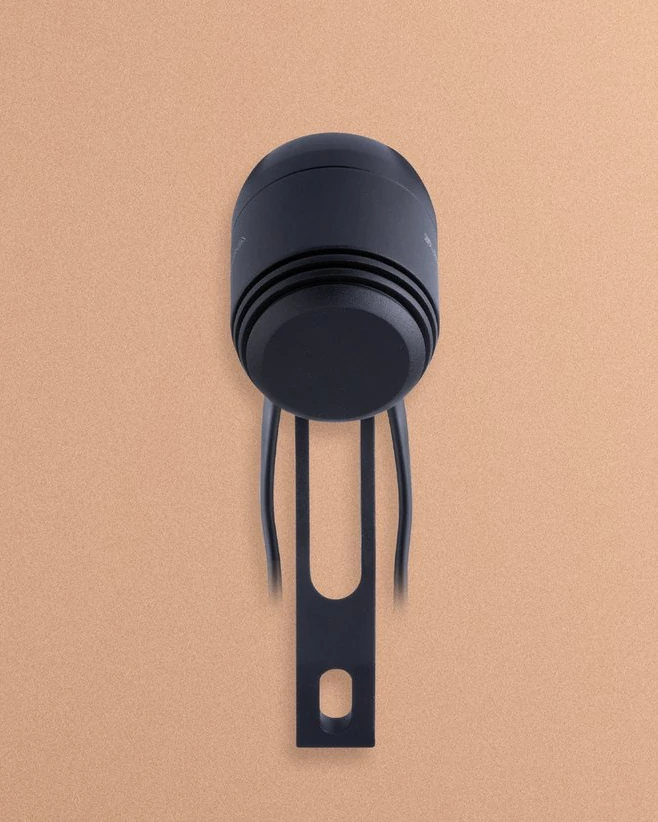 Supernova E3 Pure 3 seen from behind with its fork bracket on a peach background