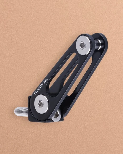 Multimount TS fork mount seen from the side with its stainless screw on a peach background